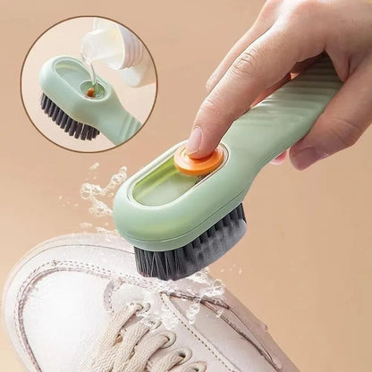 Multifunctional shoe brush with water dispensing feature for effective cleaning of sneakers
