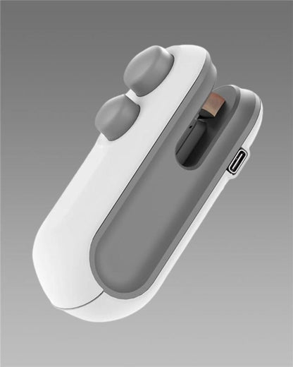 Compact mini heat sealing machine for food storage in gray and white design with easy grip buttons