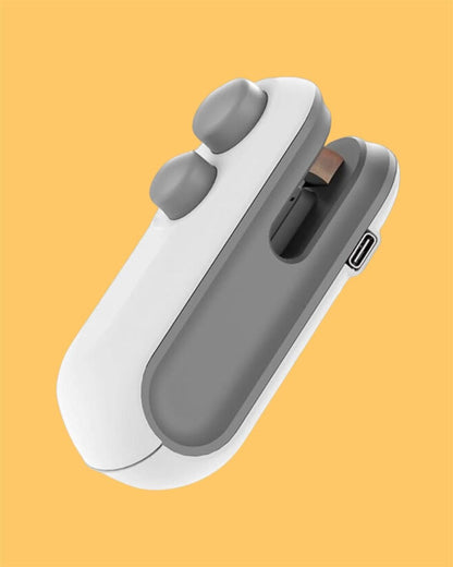 Compact mini heat sealing machine for food storage with sleek design and easy-to-use buttons
