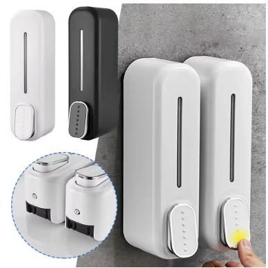 Modern wall-mounted soap dispenser in white and black with easy push button for convenient use
