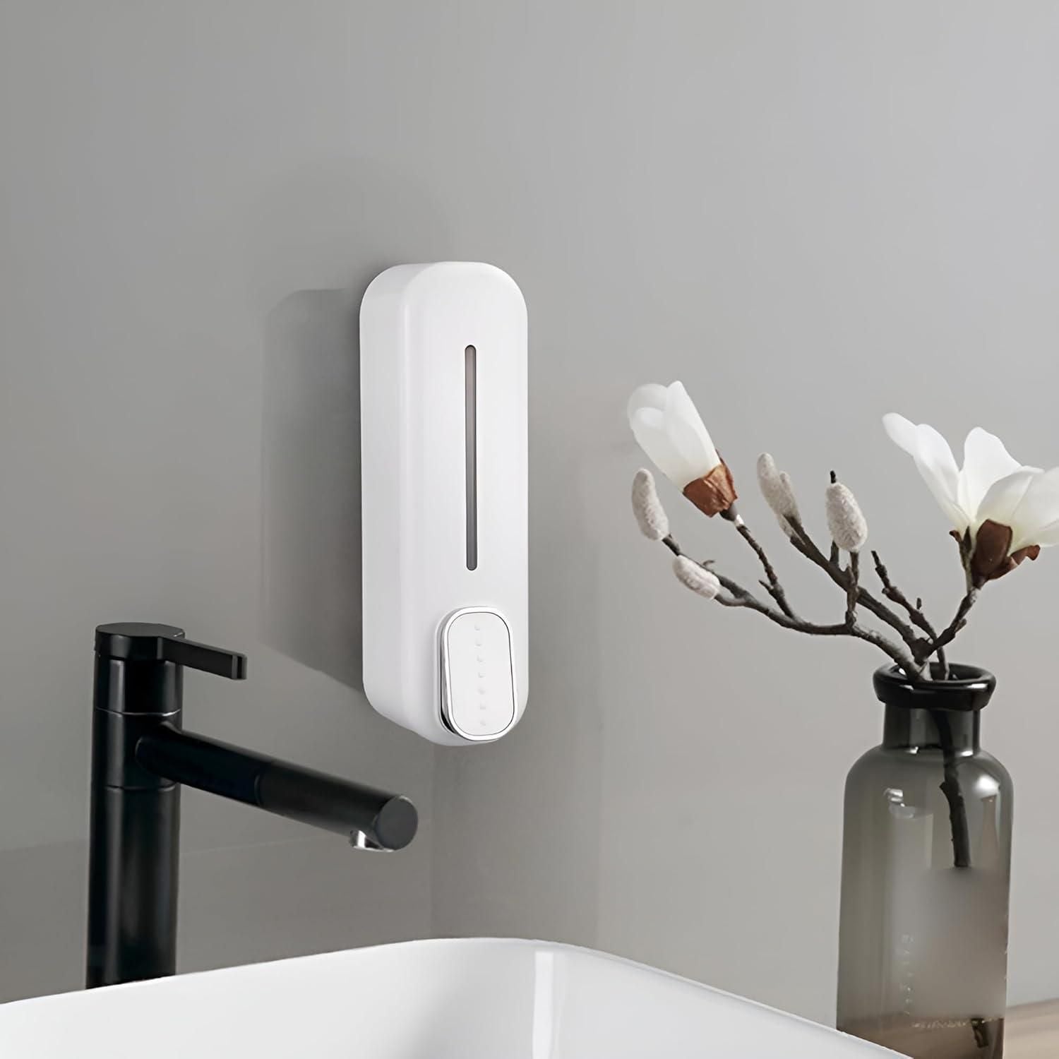 Modern wall-mounted soap dispenser in white for easy bathroom or kitchen use